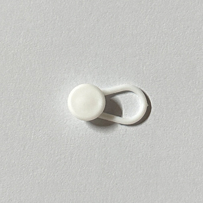 Extensor de botones para cinturilla de pantalón