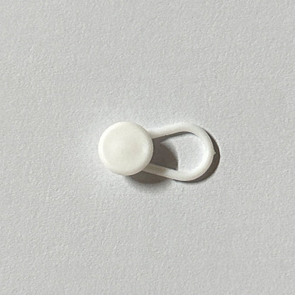 Extensor de botones para cinturilla de pantalón