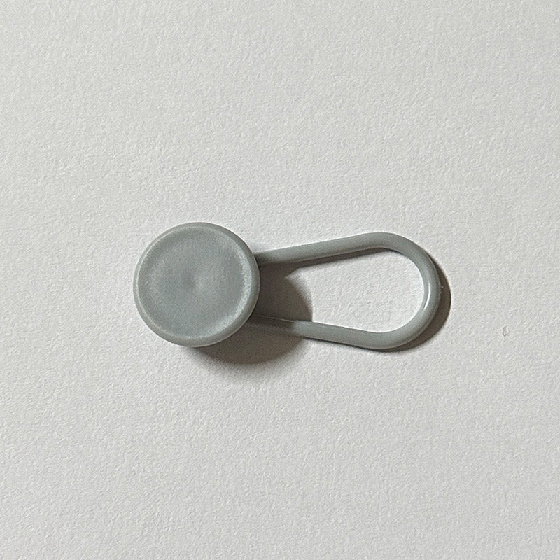 Extensor de botones para cinturilla de pantalón