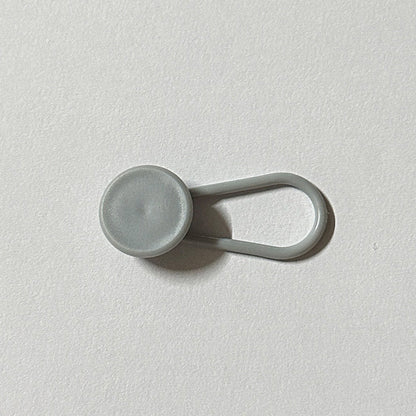 Extensor de botones para cinturilla de pantalón