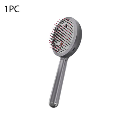 Cepillo eléctrico de masaje para el cuero cabelludo con spray 3 en 1