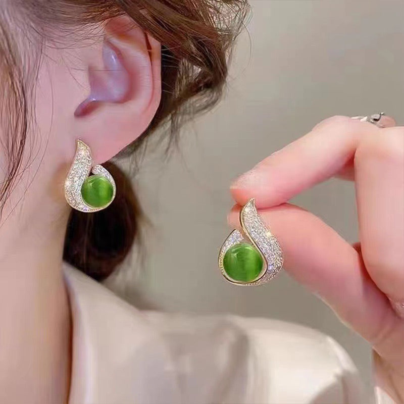 Elegantes pendientes de perla simulada y strass