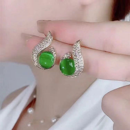 Elegantes pendientes de perla simulada y strass