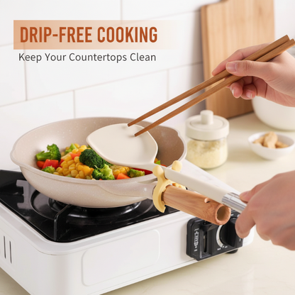 🎄Estante multifuncional de silicona para espátulas y asas de ollas🎄