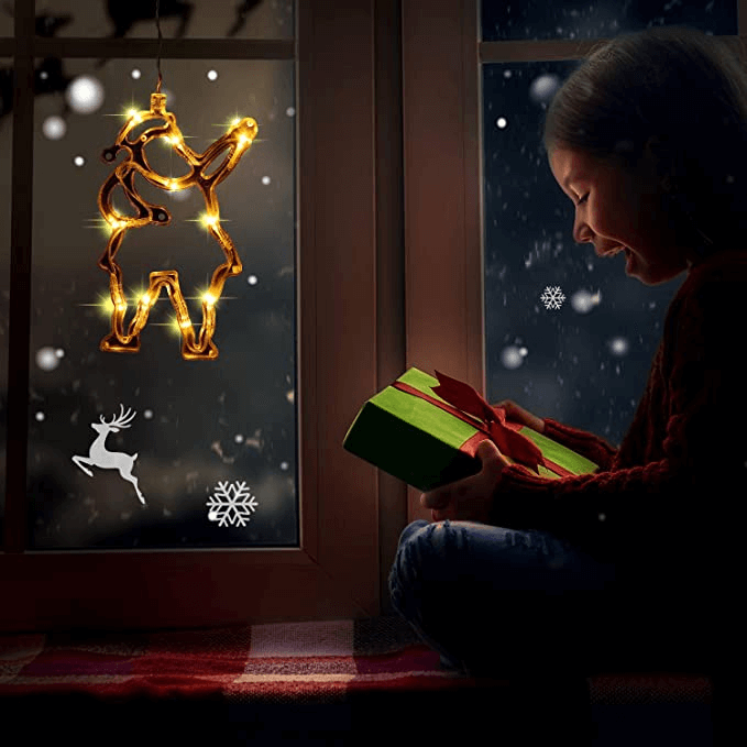 Dekorativt lys med juletema